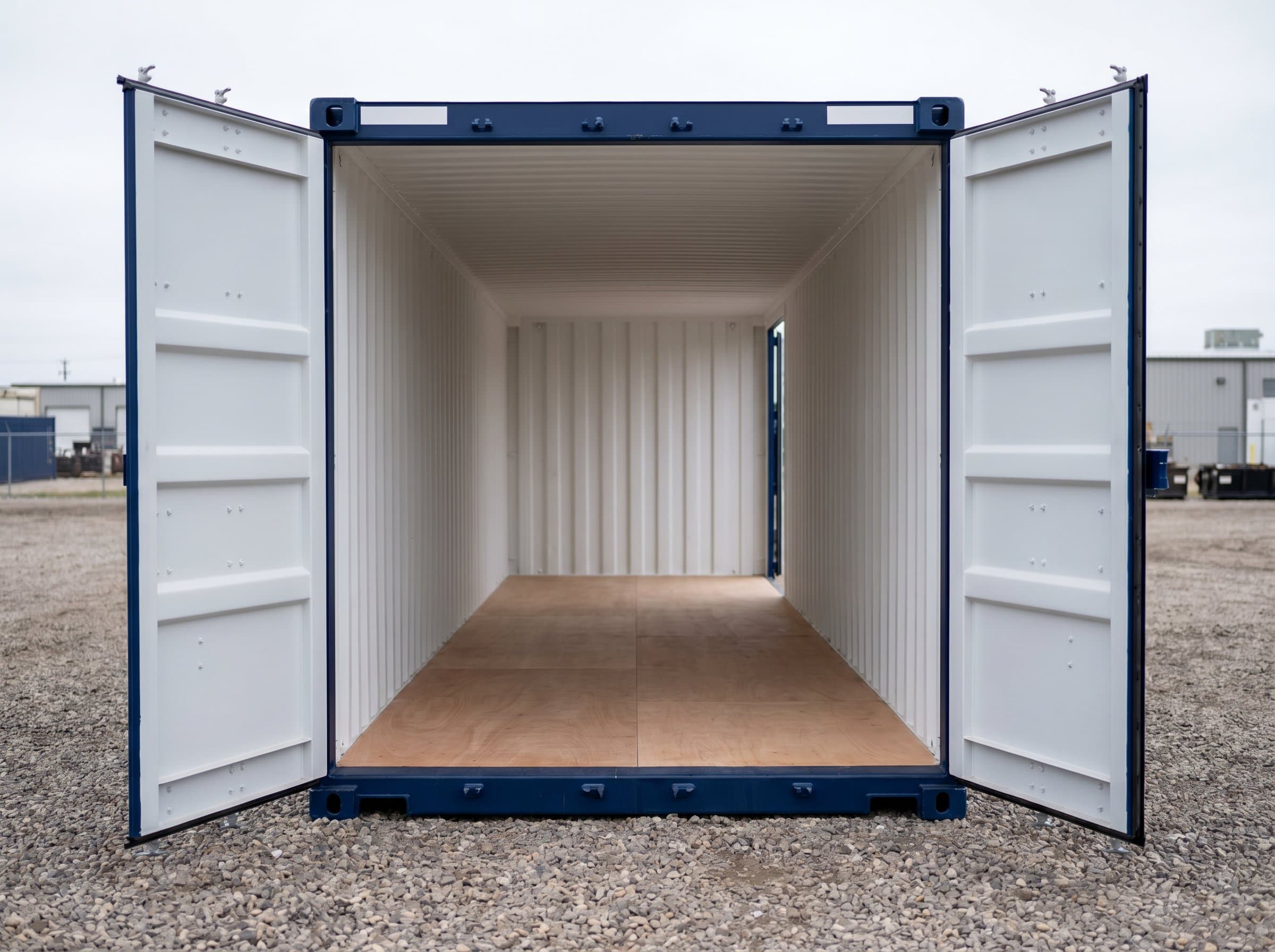 Pristine brand-new 40ft high-cube one-trip shipping container with cargo doors open, tall cavernous factory-fresh interior